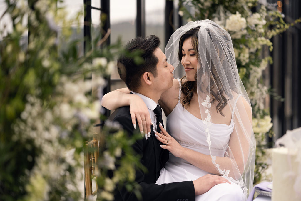 EVERLY lace edge fingertip wedding veil worn by bride in minimalist white wedding dress, romantic couple portrait, Kelowna wedding photographer, Okanagan bridal accessories