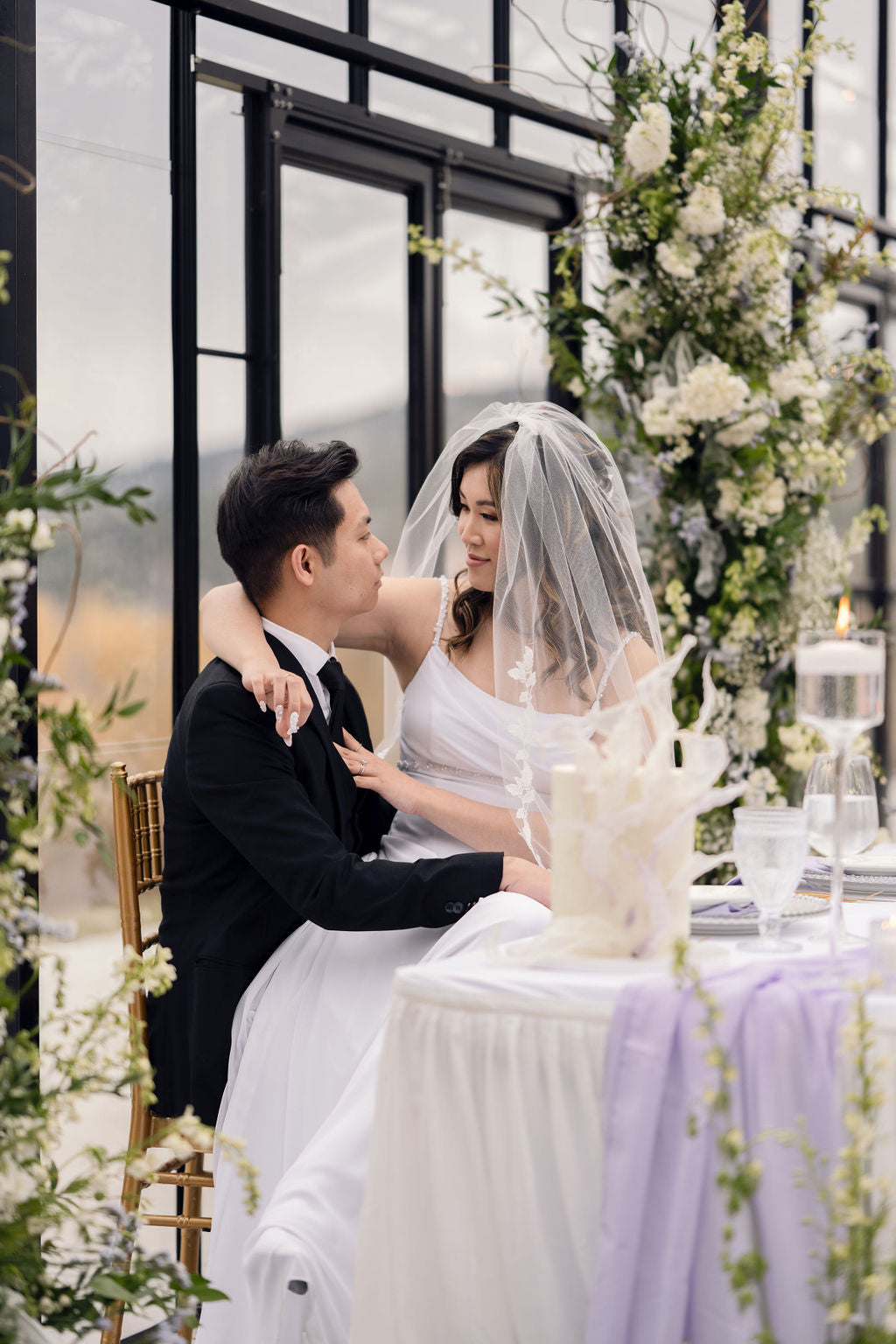 EVERLY bridal veil with delicate lace appliqué detail, fingertip length veil draping over bride's shoulders, outdoor wedding ceremony, Okanagan wedding veil