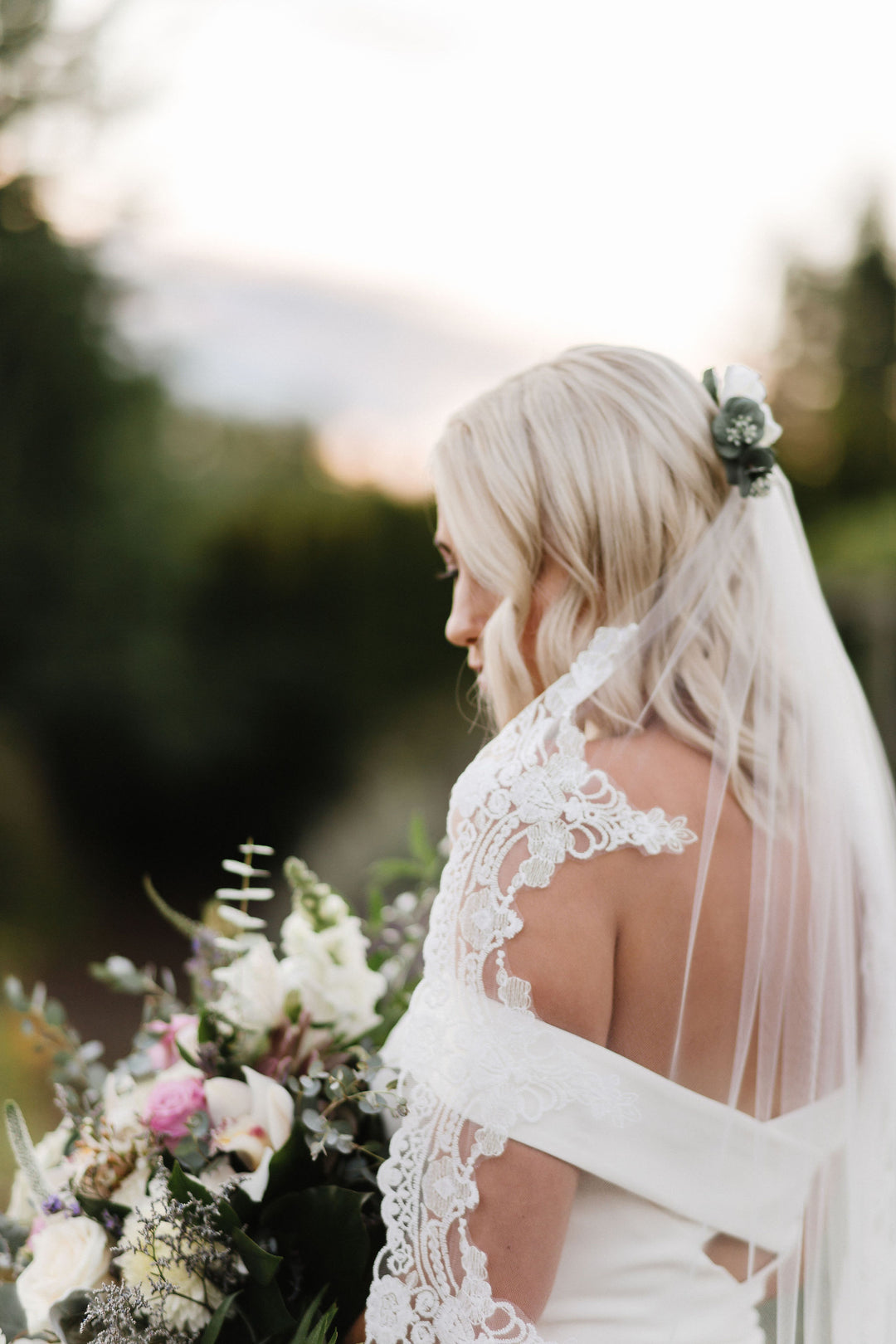 Close-up of wide ornate lace trim detail on CASSANDRA bridal veil