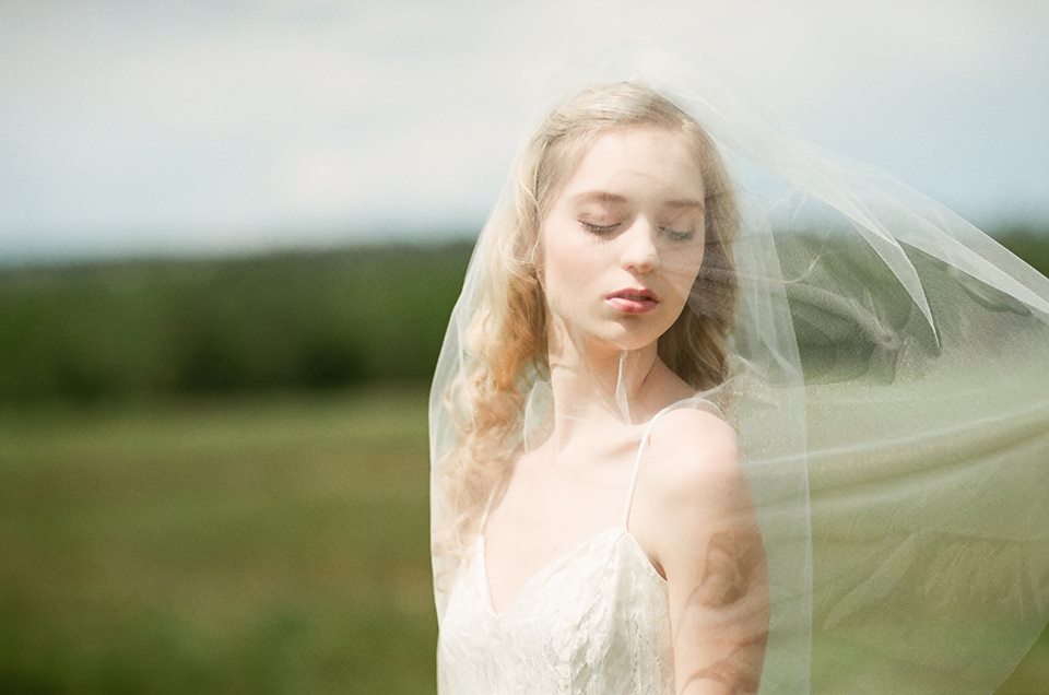 Long two tier soft tulle wedding veil drape and movement for bridal portraits