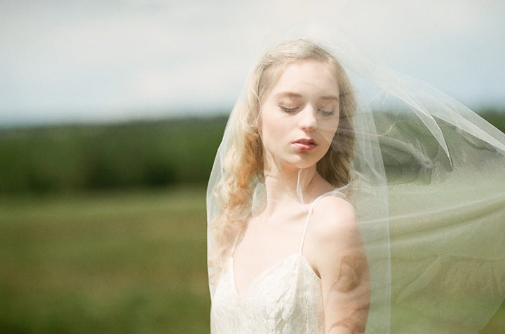 Long two tier soft tulle wedding veil drape and movement for bridal portraits