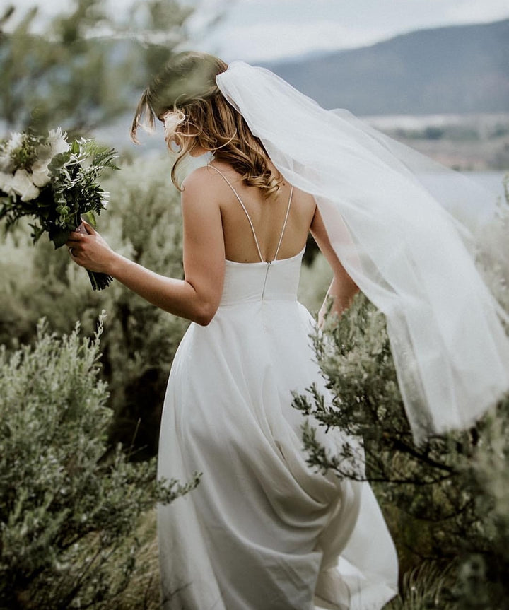 Simple and soft, single-tier, light ivory wedding veil. made in Canada and ready to ship