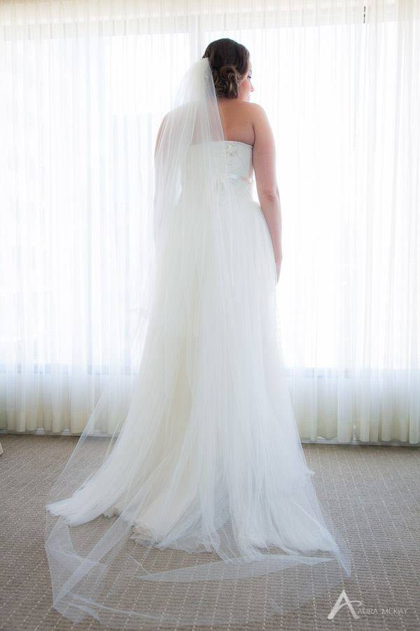 Two tier wedding veil with 36 inch blusher and 110 inch cathedral length bottom tier soft tulle single comb